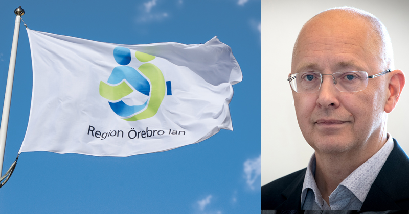 Hälso-och sjukvårdsdirektör Jonas Claesson bredvid Region Örebro läns flagga