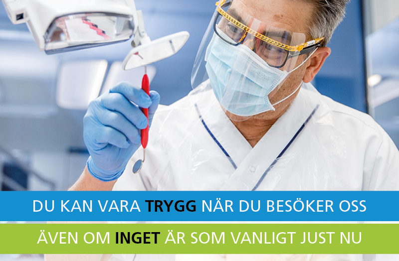 tandläkare med skyddsutrustning